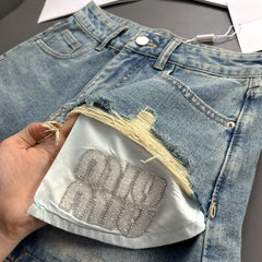 Denim shorts with rhinestone pocket design