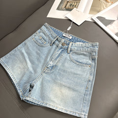 Denim shorts with back pocket embroidery