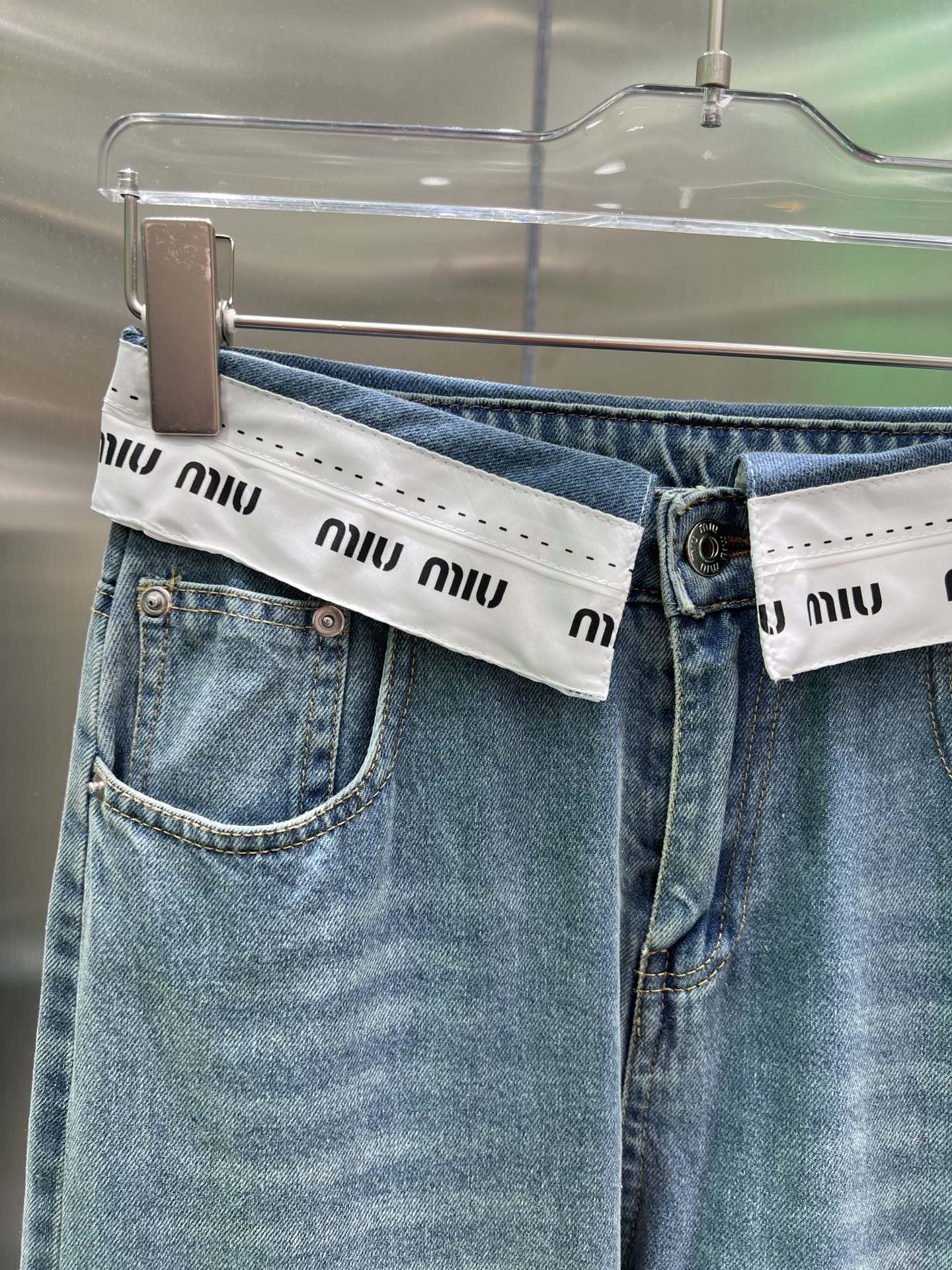 Jeans with logo on waist